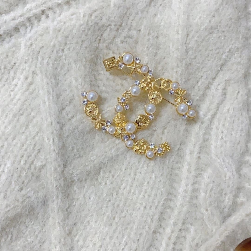 Ch*el brooches